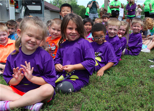 Adventures Plus students wait for community helper presentation at Wilson Elementary 